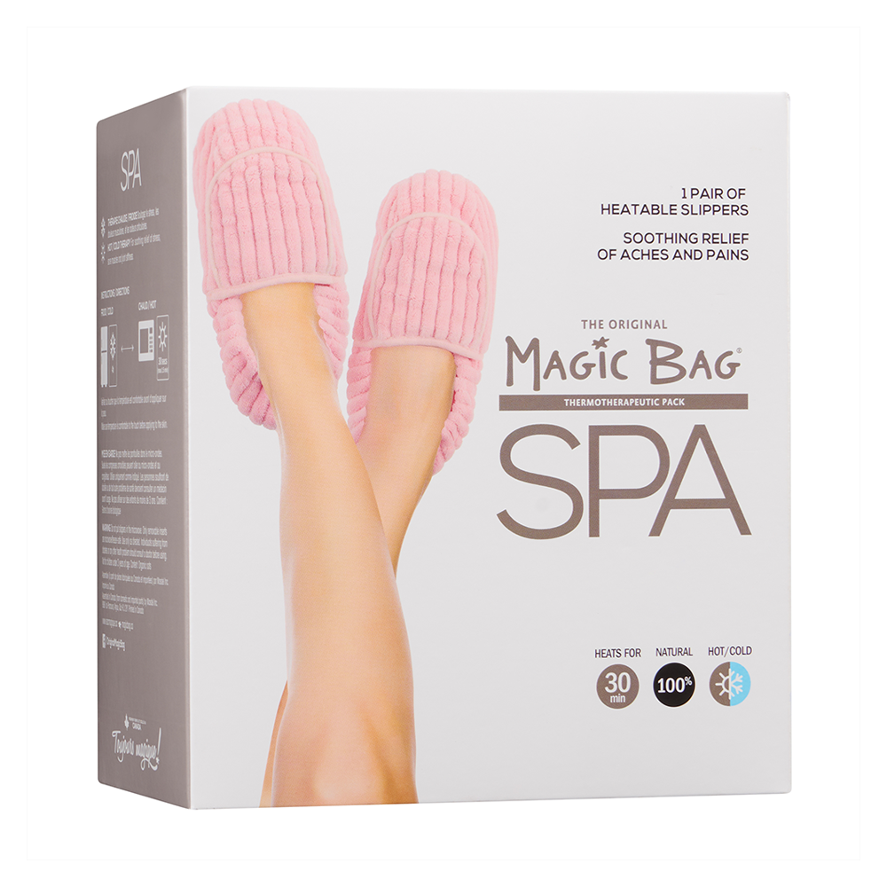 Magic Bag SPA Pink Plush Heatable Slippers in packaging with soothing relief features and organic grain-filled inserts.